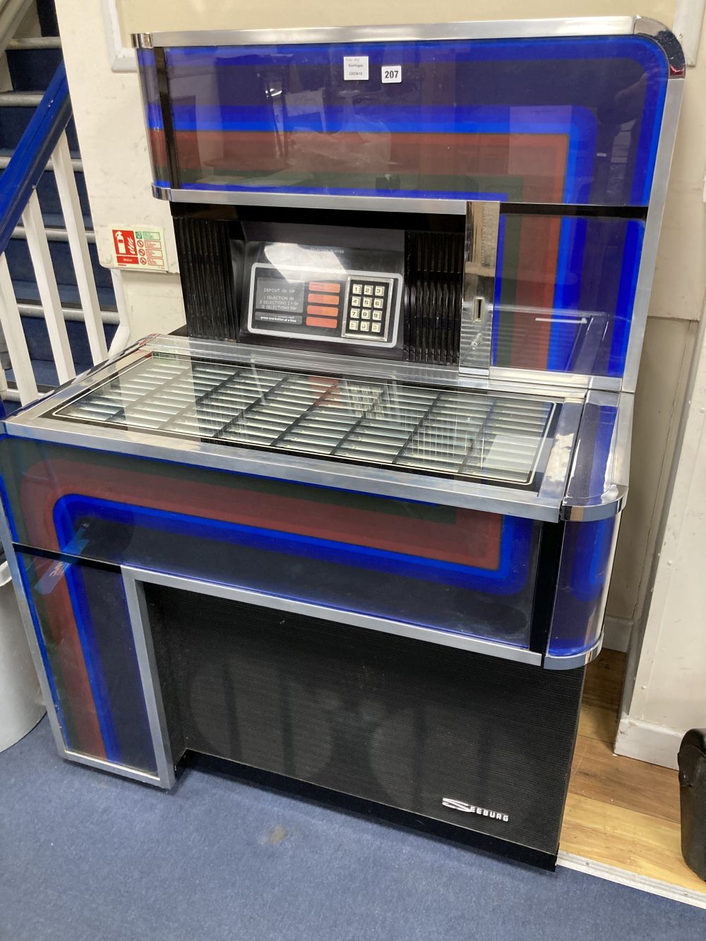 A 1970s Seeburg juke box, width 100cm depth 69cm height 136cm